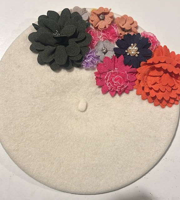 Cream felt beret with multicolor floral embellishments