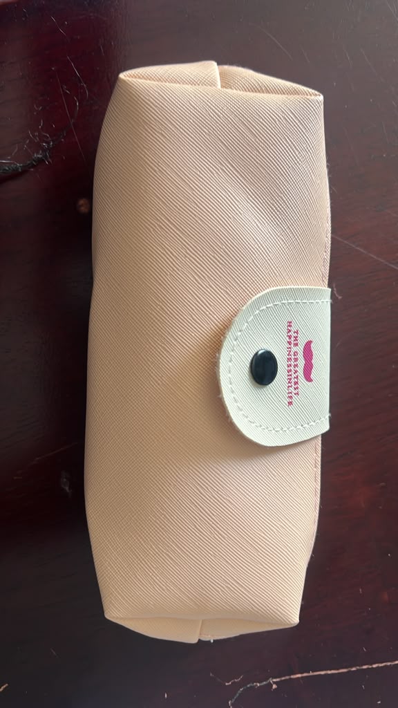 Original photo of beige crochet tool storage pouch