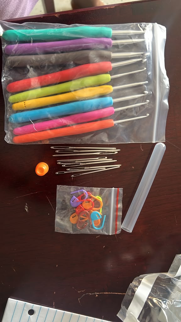 Original photo of colorful crochet hooks, needles and stitch markers