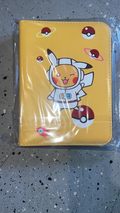 Pokémon Astronaut Pikachu 4-ring binder yellow cover with Poké Balls
