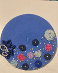 Royal blue felt beret with navy satin bow, fabric flowers and scattered silver pearl beads