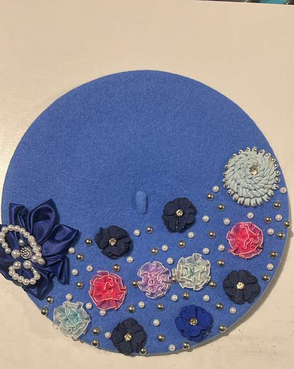 Royal blue felt beret with navy satin bow, fabric flowers and scattered silver pearl beads