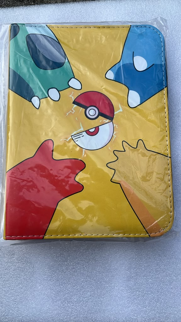 Starters Poké Ball 4-ring binder yellow background with Bulbasaur Squirtle and Charmander