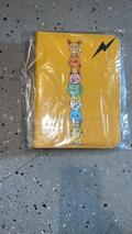 Pokémon 4-ring binder yellow cover with stacked Pokémon characters